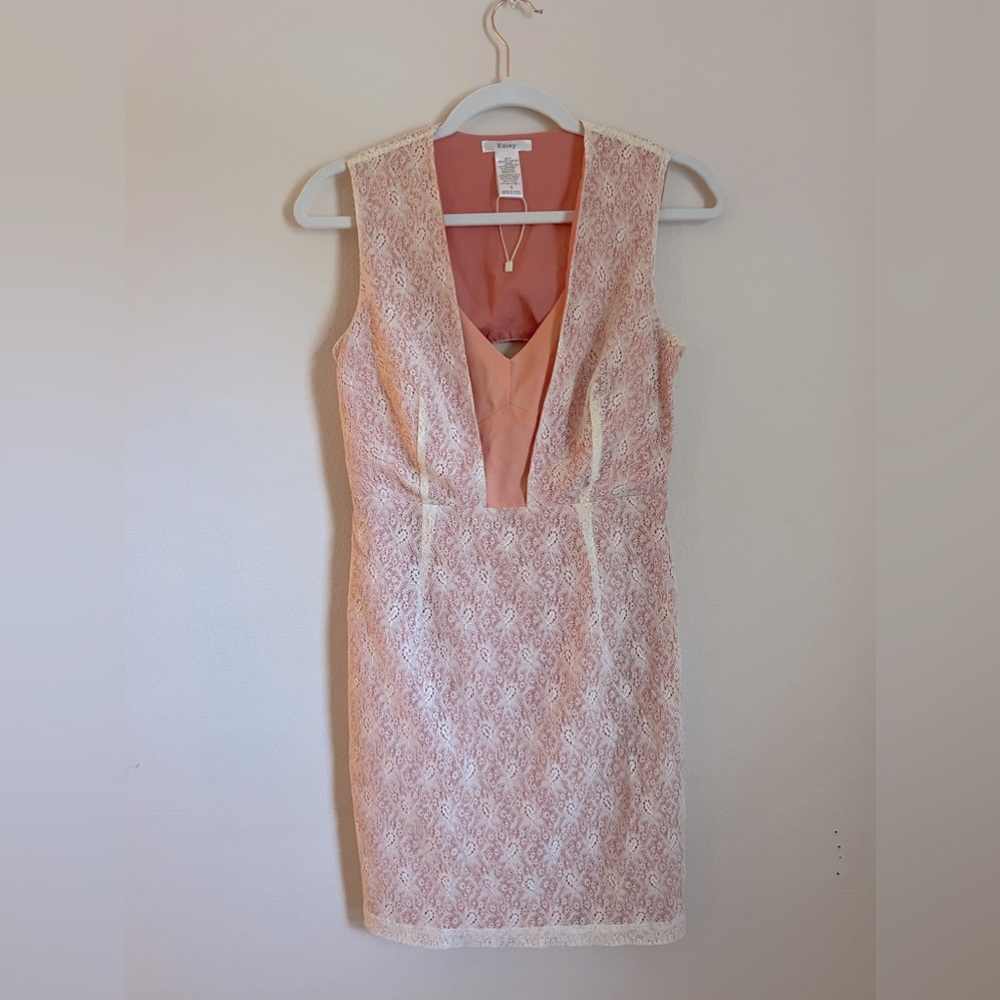 Pink and white lace dress. Flatter fit. Size small. Worn one time.